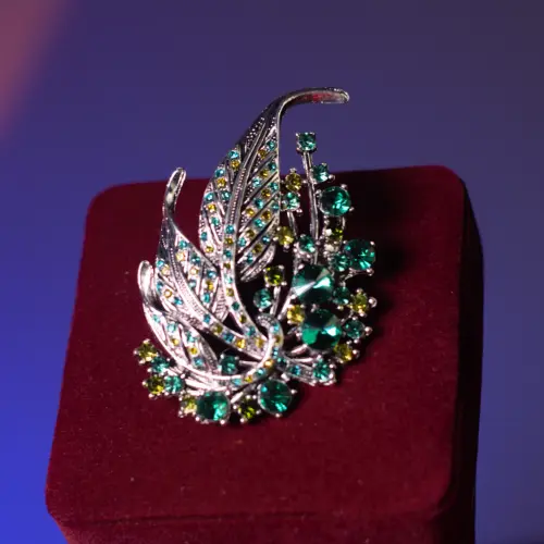 BROCHE REAL